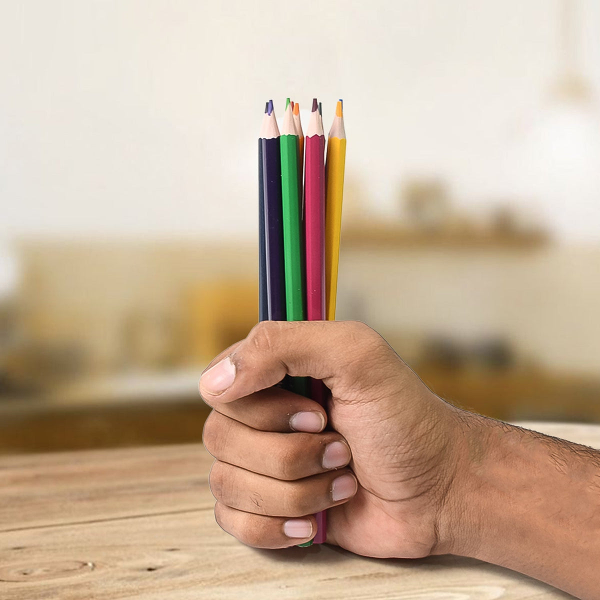 Arrangement of 12 vibrant colored pencils, perfect for artists and students.
