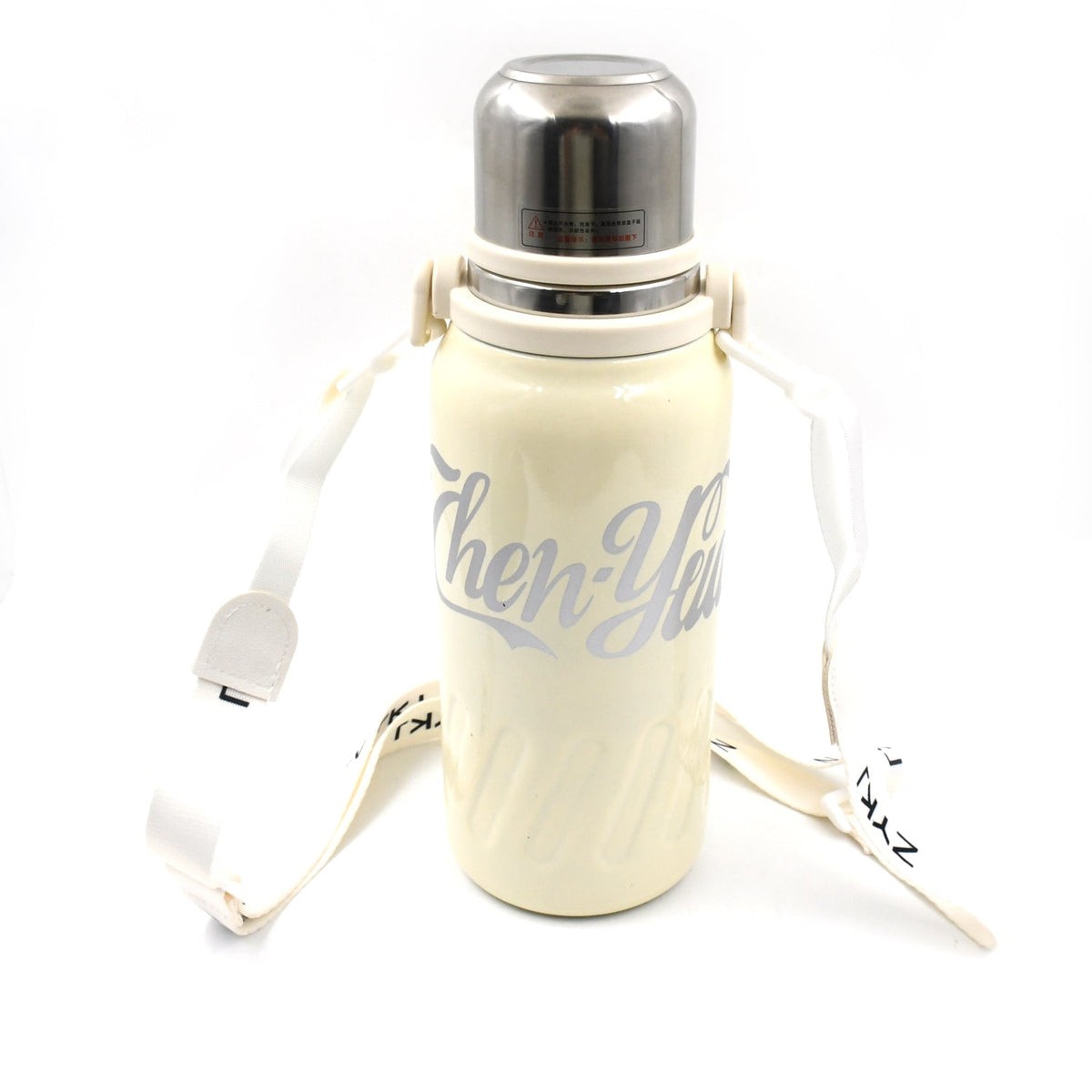 The 1200ML hot and cold water bottle being carried comfortably by its handle.