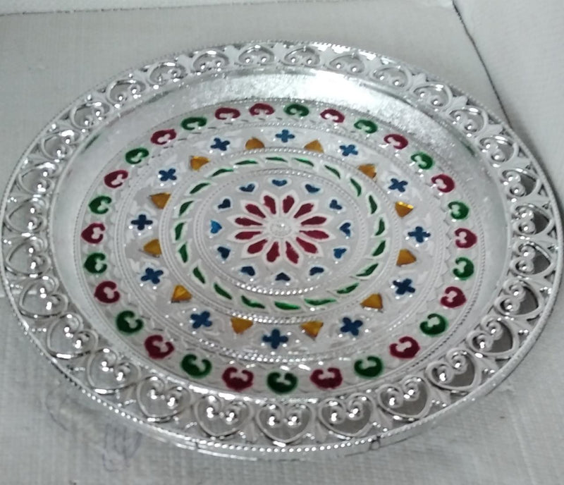 Elegant silver plated pooja thali, perfect for Indian traditional worship and ceremonies.